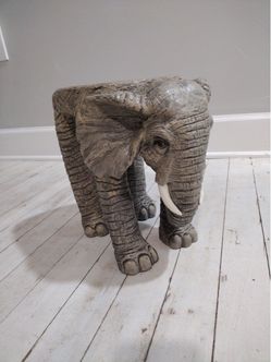 Resin elephant figurine or plant stand with ivory-colored tusks