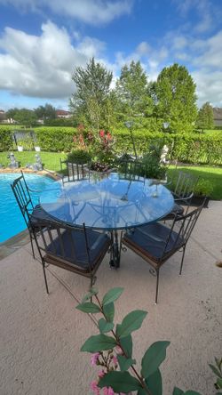 Cast iron dinner table with six chairs