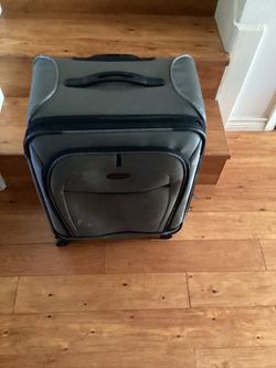 Samsonite Luggage./ Suitcase(.Grey) Dimensions are; 17”W— 10”D — 26”H.