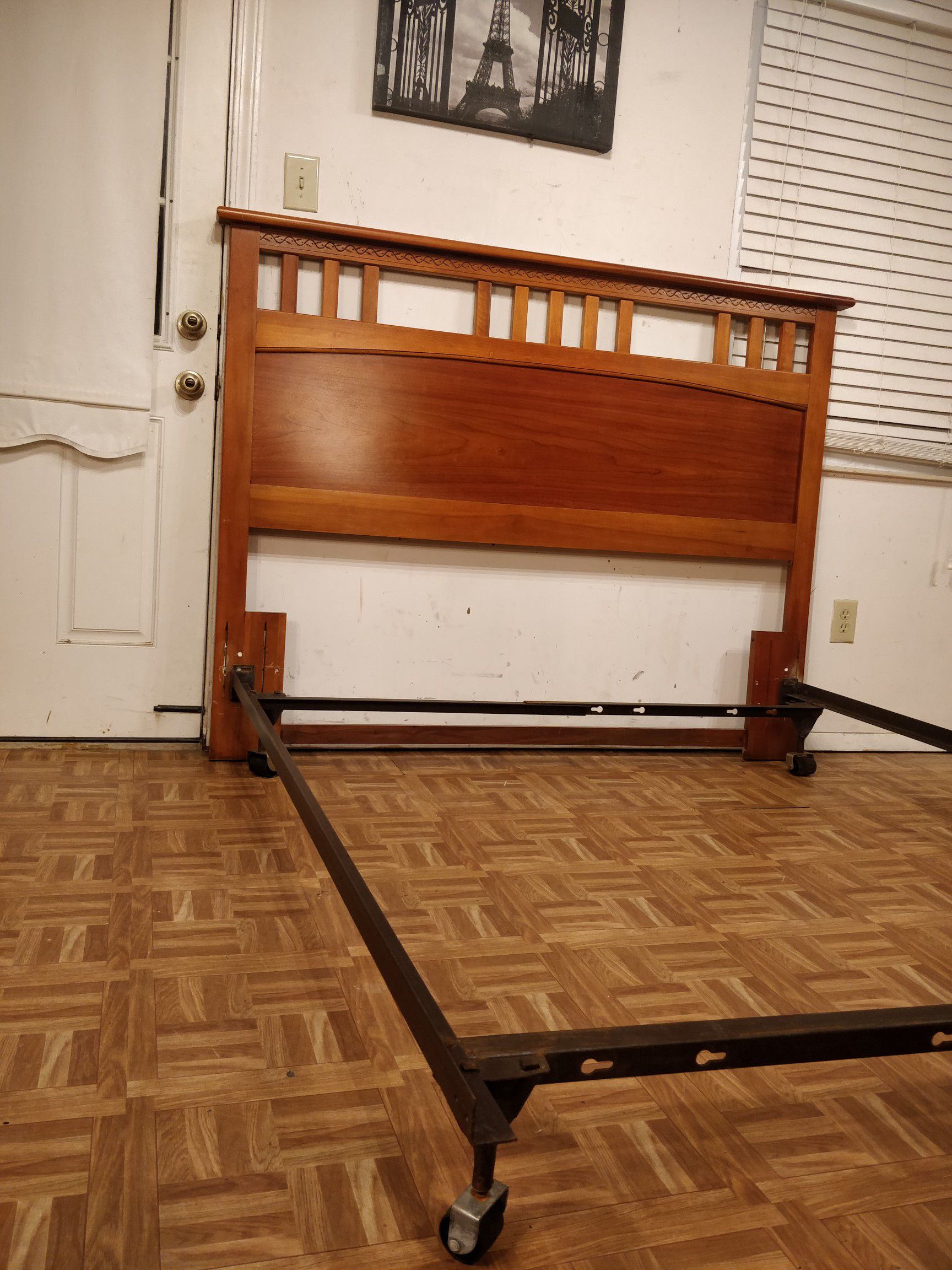 Queen/full wooden headboard with full box spring metal base in good condition, driveway pickup.