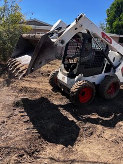 Skid steer loader track loader bobcat cat