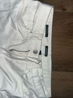 White ripped demien pants