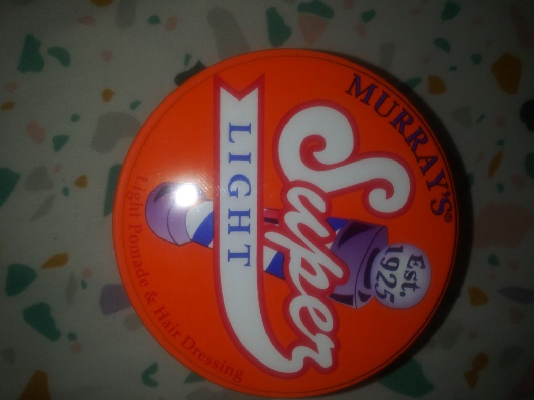 Light pomade and hair dressing