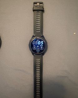 Garmin FR265 - nearly brand new condition w/charger