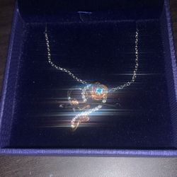 gold and silver necklace that says “i love you” 