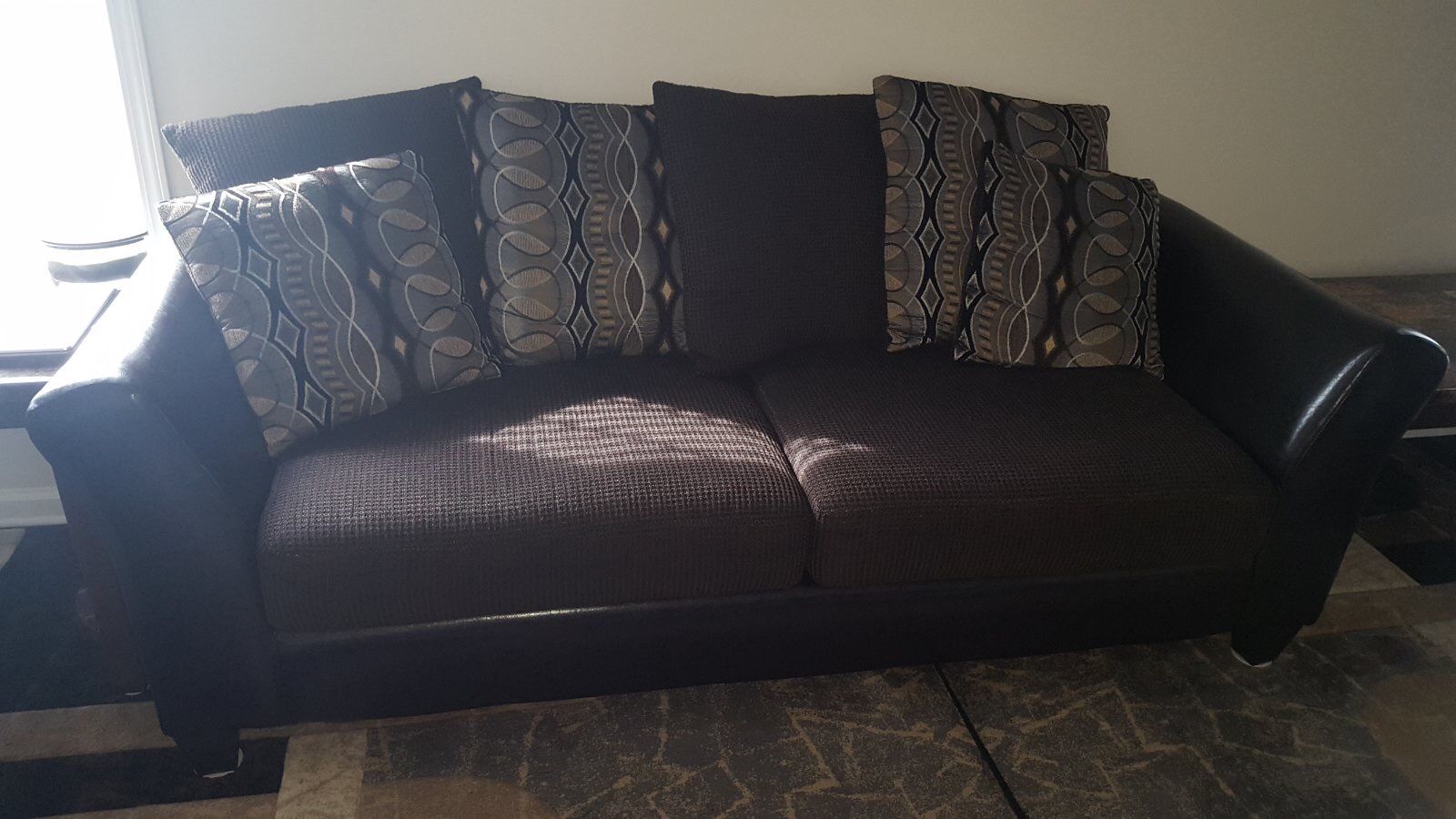 2 Sofas with leather trim and fabric cushions