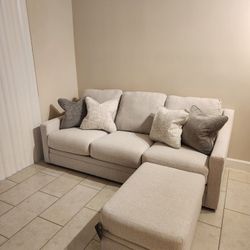 Ashley Furniture Sofa And Ottoman - Maitelynn