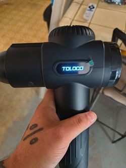 Massage gun with attachments