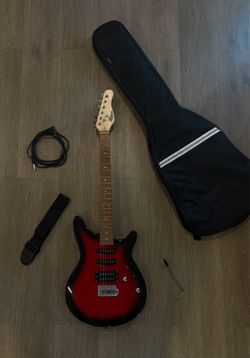 Rouge Rocketeer rr100 red guitar