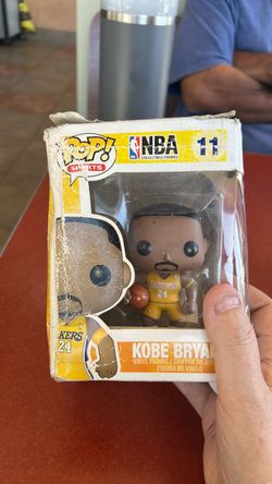 Kobe Bryant Funko bobble head number 11 width, yellow armband distre I don’t know 🤷🏻 cond