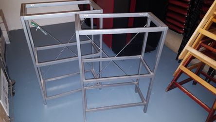 Shelf. Metal with glass shuelves 12x24. Brand new.