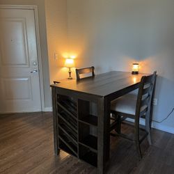 Beautiful, solid wood dining table with four chairs
