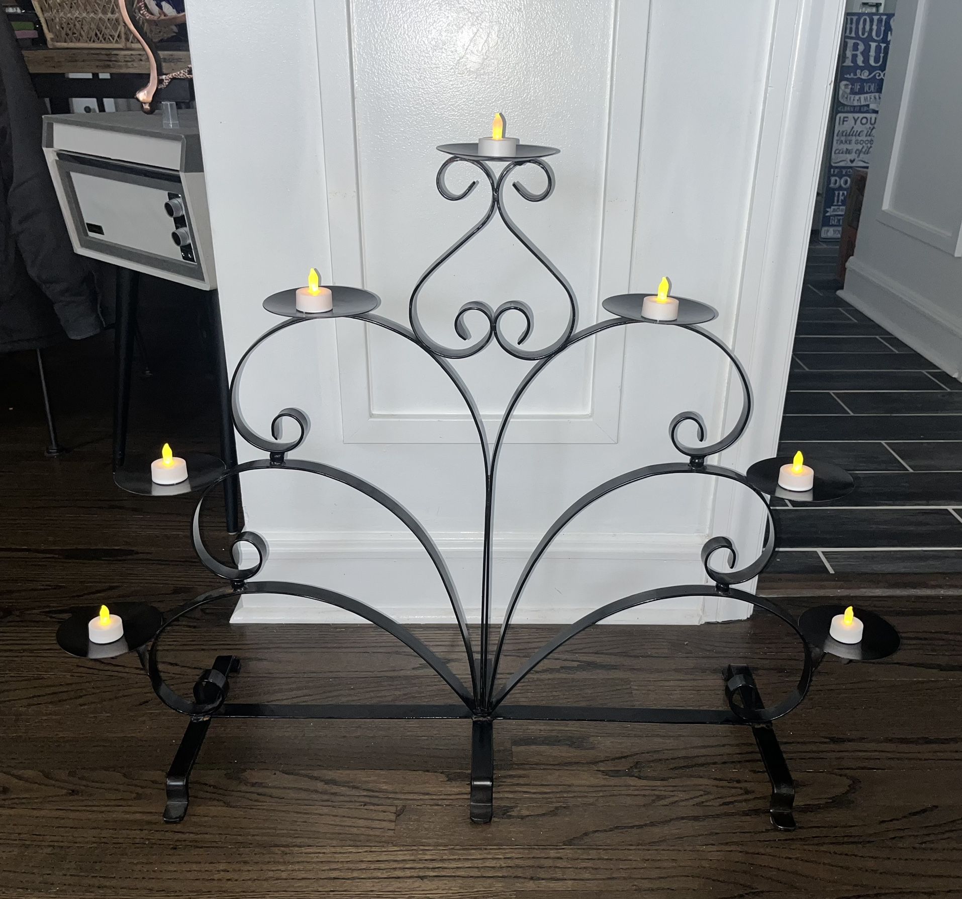 LARGE BLACK WROUGHT IRON 7 PILLAR CANDLE STAND