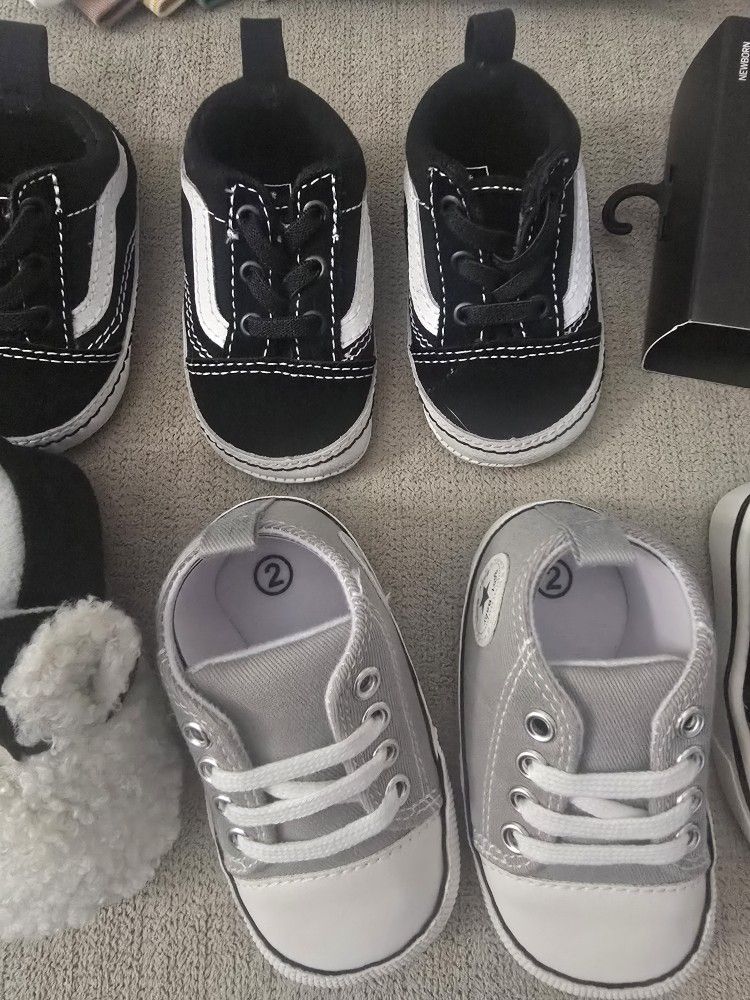 Two Pairs Of Vans And Other Shoes