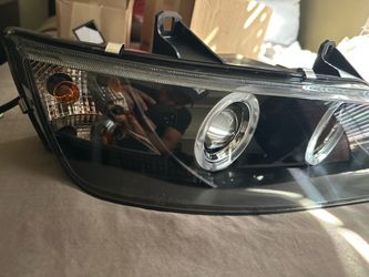 1(contact info removed) bmw z3 Projector Headlight with Halo Ring and Amber Corner