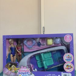 Barbie boat comes with two dolls
