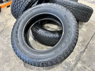 FREE INSTALL 4X LIKE NEW GOODYEAR AT TIRES LT275/65R20 10 PLY LOAD RANGE E