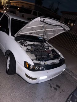 White 95 Toyota Corolla Sedan Modified
