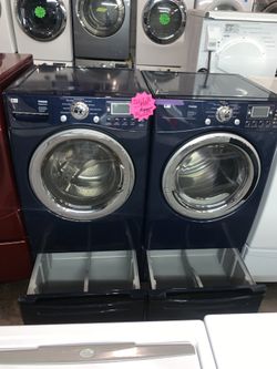 LG front load washer and electric dryer with pedestals working perfectly with 4 months warranty