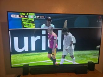 75" TCL Roku with TV Stand