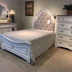 Realyn Two Tone Upholstered Panel Bedroom Set
Ashley Furniture$10 Down Payment And Financing Available