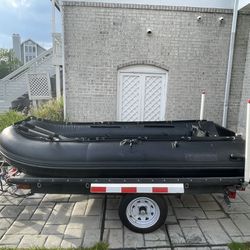 10.5 ft boat with custom trailer