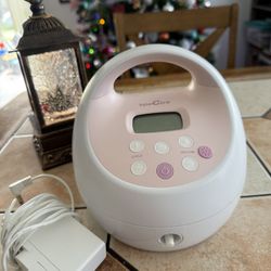 Spectra Breast Pump And Milk Collecting Bags