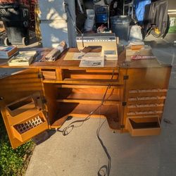 Singer Athena 2000 Sewing Machine and Cabinet with manual and accessories.