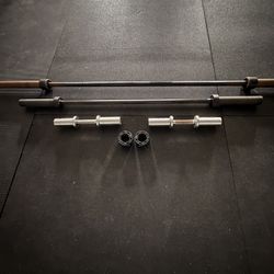 2 Olympic Bars, 190  Lbs. Of Bumper Plates, Adjustable Bench, Collars Rubber Mats Plus 2 FREE…