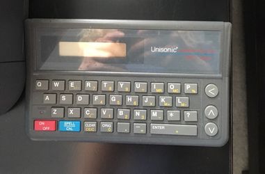 VINTAGE UNISONIC WORD PRO 305 SPELL MAN SPELLING CHECKER AND CALCULATOR