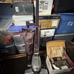 Kirby with shampoo attachments