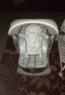 Brand new swing and bassinet