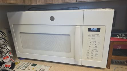 Microondas with extractor