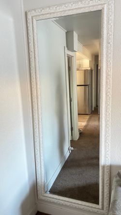 6’7 long mirror with design on the sides
