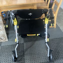 Used Very Little Medline Adult Walker Chair With Brakes And A Seat