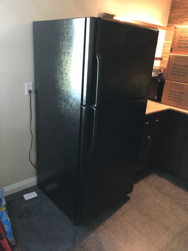 GE BLACK REFRIGERATOR WITH ICE MAKER. Moving - MUST BE ABLE TO PICK UP ...