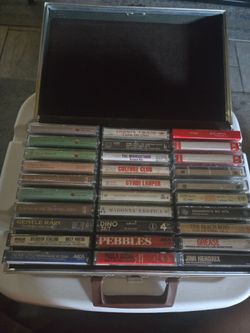 Suitcase with Tapes $100