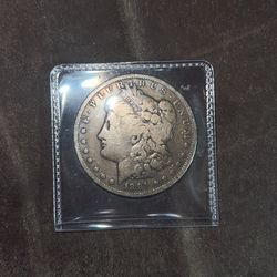 1891 Morgan Silver Dollar. 1.5carot Ruby Gemstone