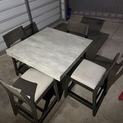 Table and 4 chairs
