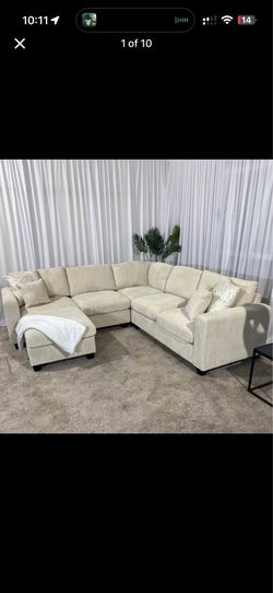 Ivory  cream corduroy sectional sofa with ottoman