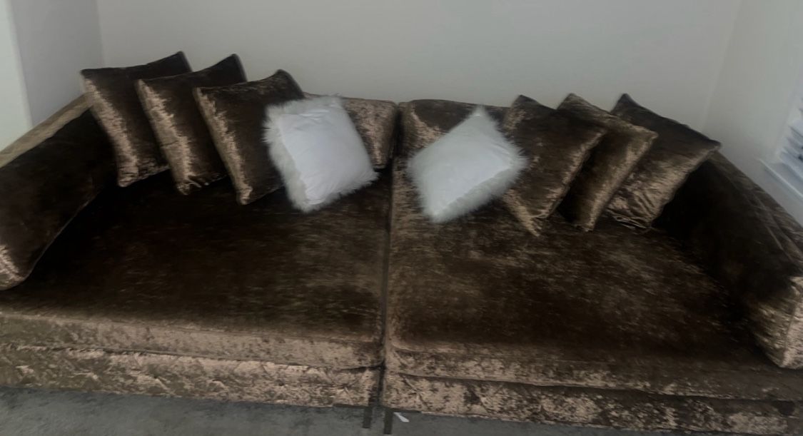 Two Pice Brown Section Furniture With 6 Brown Pillows White Pillows Not Included. $500