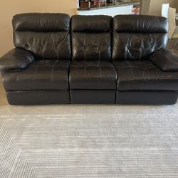 3-Seat Leather Sofa – Two Manual Recliners