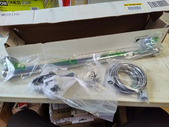 Delta 56302 shower grab bar with sliding showerhead bar and hose in chrome