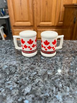 Vintage Canadian Canada Souvenir Pair of salt and pepper shakers.  Size approximately 2 1/4 inches tall.  Brand new never used.
