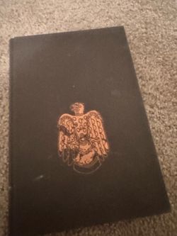 Dark Hardcover Book with Eagle Emblem