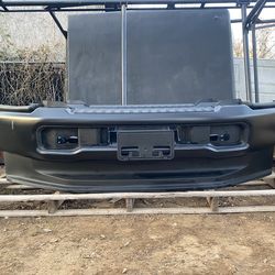 BUMPER NUEVO ORIGINAL PARA F250 F350 23-26