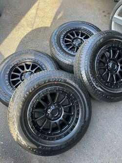 New 18" american outlaw wheels rims Toyota Chevy Gmc Cadillac Nissan Ram bridgestone 265/70/18 tires hablo español 6x139.7 6x5.5