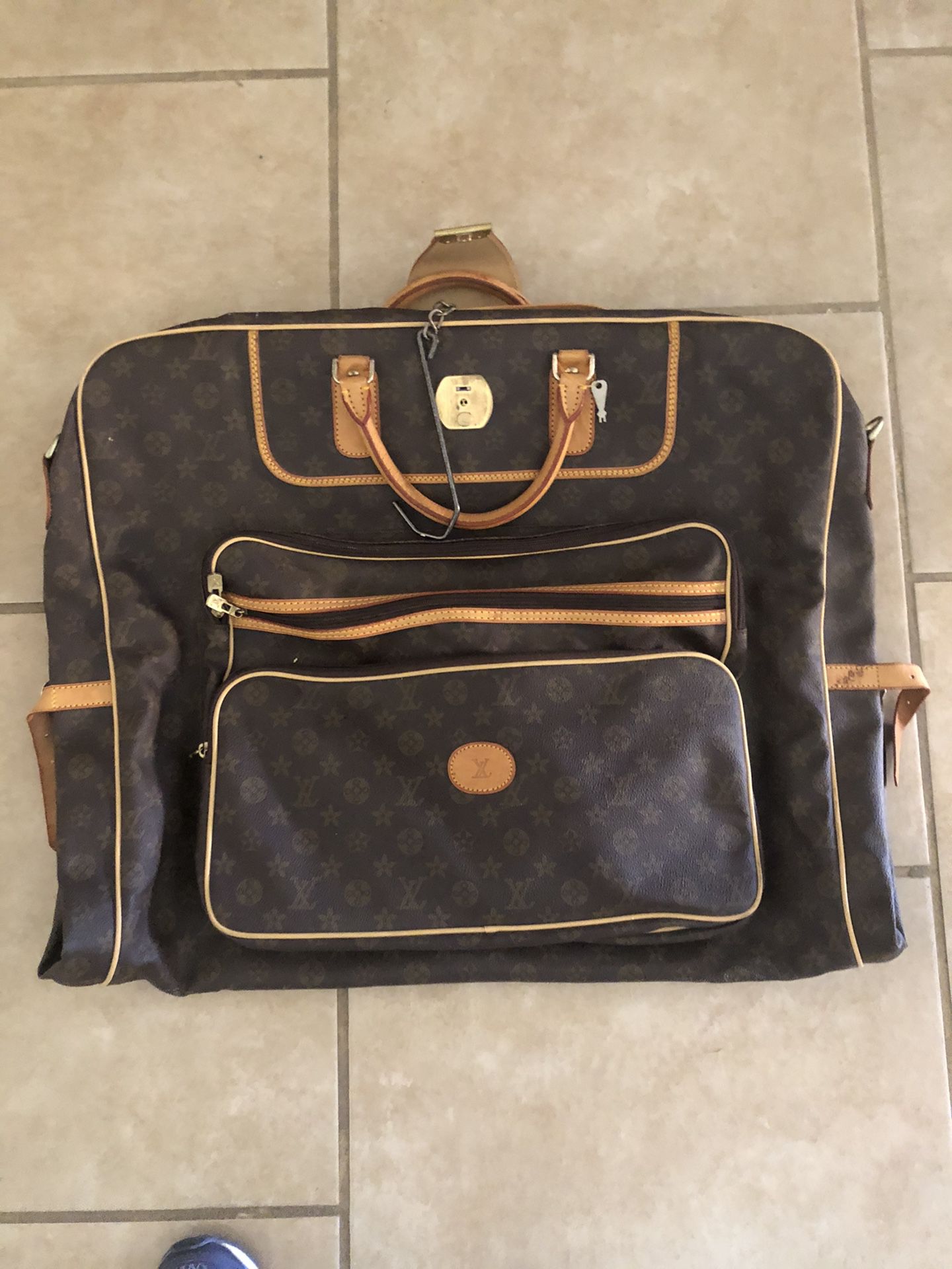 Louis Vuitton Garmet Bag for traveling