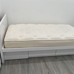 Custom white Formica twin size platform bed with drawers underneath deep and mattress