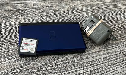 Nintendo DS with Mario Kart game in excellent condition, complete with OEM Nintendo charger. $70